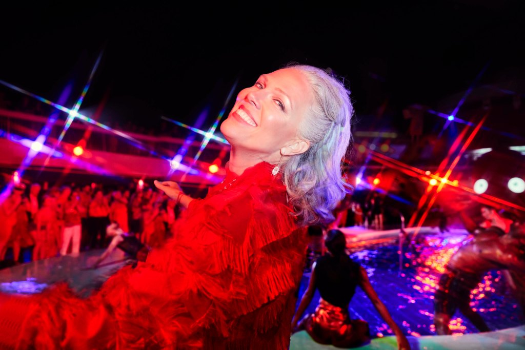 A woman smiles at the camera during Scarlet Night. There's a party behind her and everyone is wearing red.
Alberto Oviedo, Lifestyle, Now We're Voyaging
Now We're Voyaging Campaign
Photographer: Alberto Oviedo
Studio: Christian Schrader, Kathy Boos
Brand: Billy Bohan